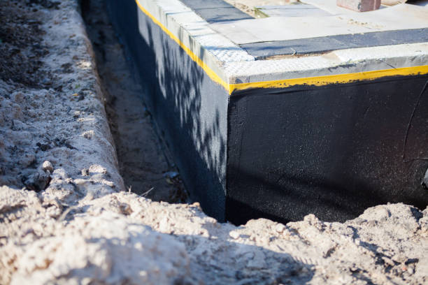 Professional Emergency Waterproofing technician working in Unionville, VA